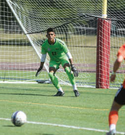 Aaron Fraire playing soccer, goal-keeping